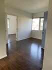 Living area with coat closet - 609 N Mariposa Ave Apartments Unit 609