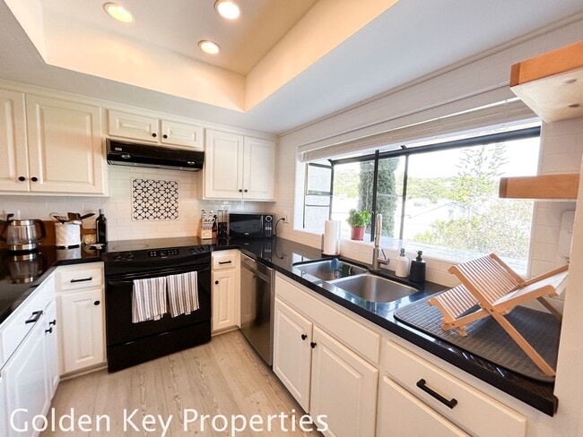 Photo - Welcome to this stunning ***unfurnished*** tri-level condo in the desirable Casitas de la Costa c... Unit B