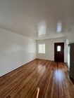 Living Room - 256 17th St Apartments Unit FRONT
