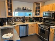 kitchen with gas stove - 4608 Nob Hill Dr