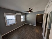 Primary bedroom with door leading to the second bedroom - 4828 Sawtelle Blvd House