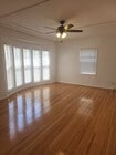 447 E LIVING RM - 447 N Oakhurst Dr Apartments Unit E