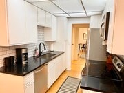 Full Kitchen with Stove, Microwave, Fridge/Freezer, Dishwasher, Coffeemaker - 1131 Alta Loma Rd Unit 123