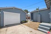 Garage & side yard - 672 E 119th St House
