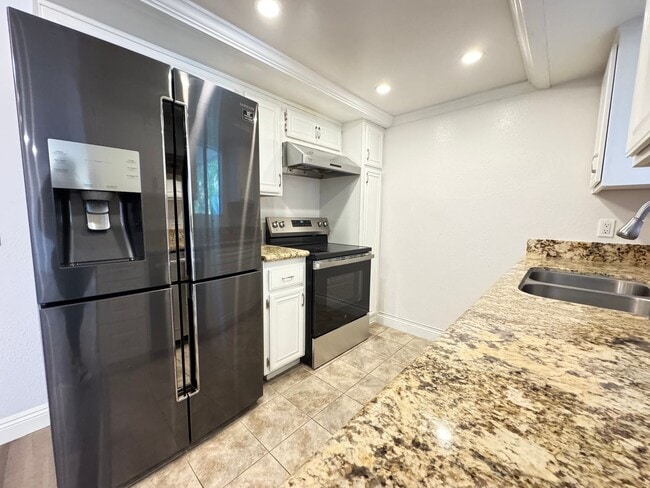 Photo - Beautiful 2Bd/2Ba Condo w/2 Reserved Parking Spaces, Extra Storage and Patio in Fullerton!