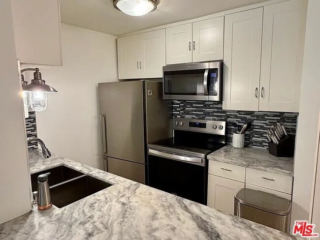 Photo - 7777 W 91st St Unit A