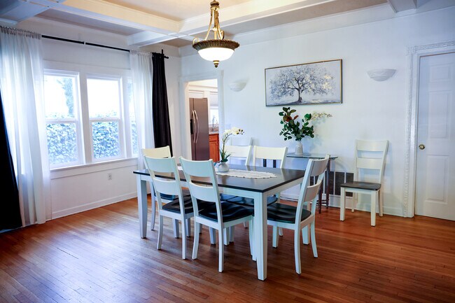 Large dining table with 8 chairs - 2005 N Beachwood Dr
