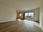 living room with view - 2721 2nd St Unit 202
