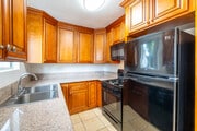 2BR, 1BA - 900SF - Kitchen - Chateau Whitsett Apartments