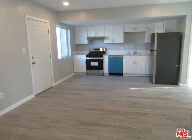 Photo - 1246 W 144th St Townhome