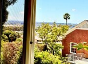 Living room window with some ocean view - 1760 N Fairfax Ave