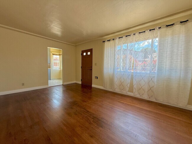 Photo - Cozy Two Bedroom Duplex w/ Hardwood Floors! Lovely Kitchen! Lots of Natural Light!