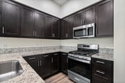2BR, 2.5BA - 1,649SF - Kitchen - Mayfair Apartments