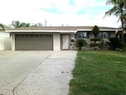 3-Car Driveway + Garage - 7635 Birchleaf Ave House