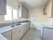 Photo - 1515 W 147th St Townhome