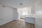 2BR, 1BA - 850SF - Dining Room - The Courtyard Apartments