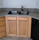 Stainless steel double sink with pull out faucet and garbage disposal. - 314 20th St Unit D