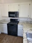 Photo - New Vinyl Flooring and Fresh Paint! 2 Bedr... Townhome