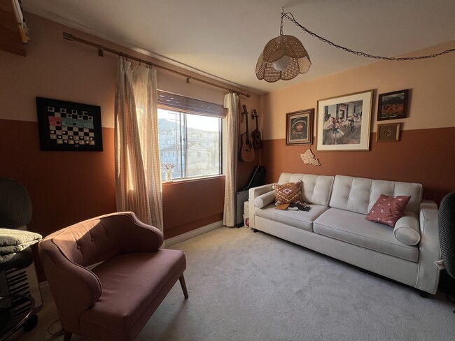 Office-Bedroom Conversion - Pop-up desk under window with mountain view. Comfy fold-out Queen bed. - 620 E Harvard Rd Unit G