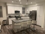 Common kitchen area with access to stove, refrigerator, dishwasher, and other culinary appliances. Dining area not pictured. - 1434 Santa Victoria Road