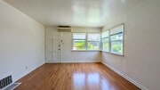 Living Room - 129 Genoa St Apartments Unit A