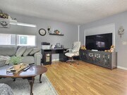 Photo - Adorable Upper Unit Condo with 1 Car Garage! Unit 4