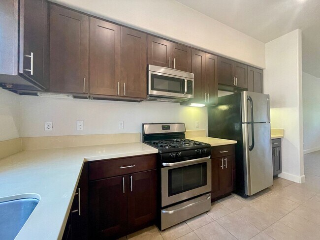 Photo - 3 Bed/3 Bath, 2 Garage & 2 Balconies Gated...