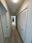 Hallway to bedroom kitchen - 304 N Meadows Ave House