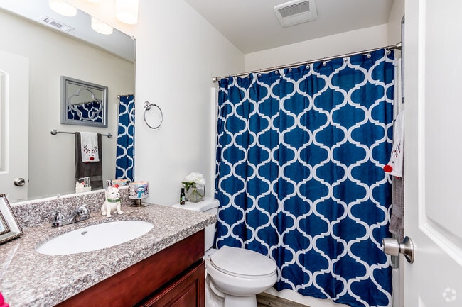 2BR, 2BA - 1074 SF - West Main Villas