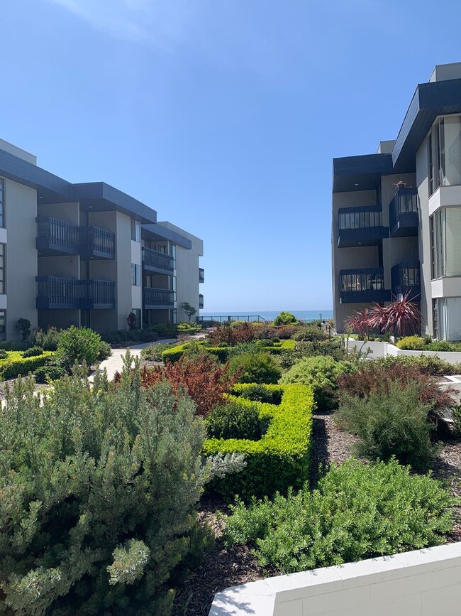 Building Photo - AT THE BEACH! 3 Bedroom + 2 Bathroom Condo... Unit 215