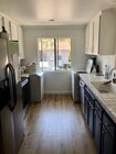 Kitchen has two windows and is always light and bright. - 23705 Sea Breeze Ln Condo Unit 23705