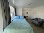 queen bed - 4510 N Figueroa St Apartments Unit 3