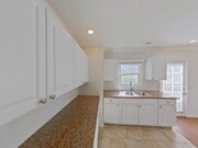 Photo - Charming 2BR Duplex Near SB Bowl w/ 1 car ... Apartment Unit A