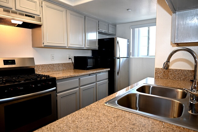 Kitchen area with views of the Hollywood Hills - Cloverdale Apartments