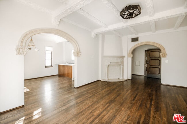 Building Photo - 1302 N Sweetzer Ave Unit 203