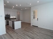 Photo - 4BR 3BA two-story condo with 2 Car Attache...