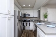 FULLY EQUIPPED KITCHEN - Smoketree Apartments