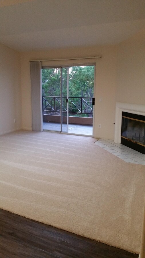living room with gas fireplace and patio - 3215 Costa Alta Dr Unit 86