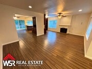 Photo - Spacious 5 Bedroom Home Near Victoria Ave with Easy Freeway Access