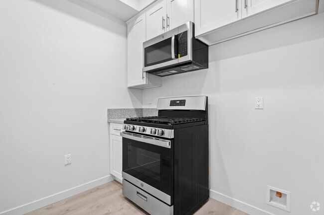Building Photo - 8444 Columbus Ave Unit 305 Rental
