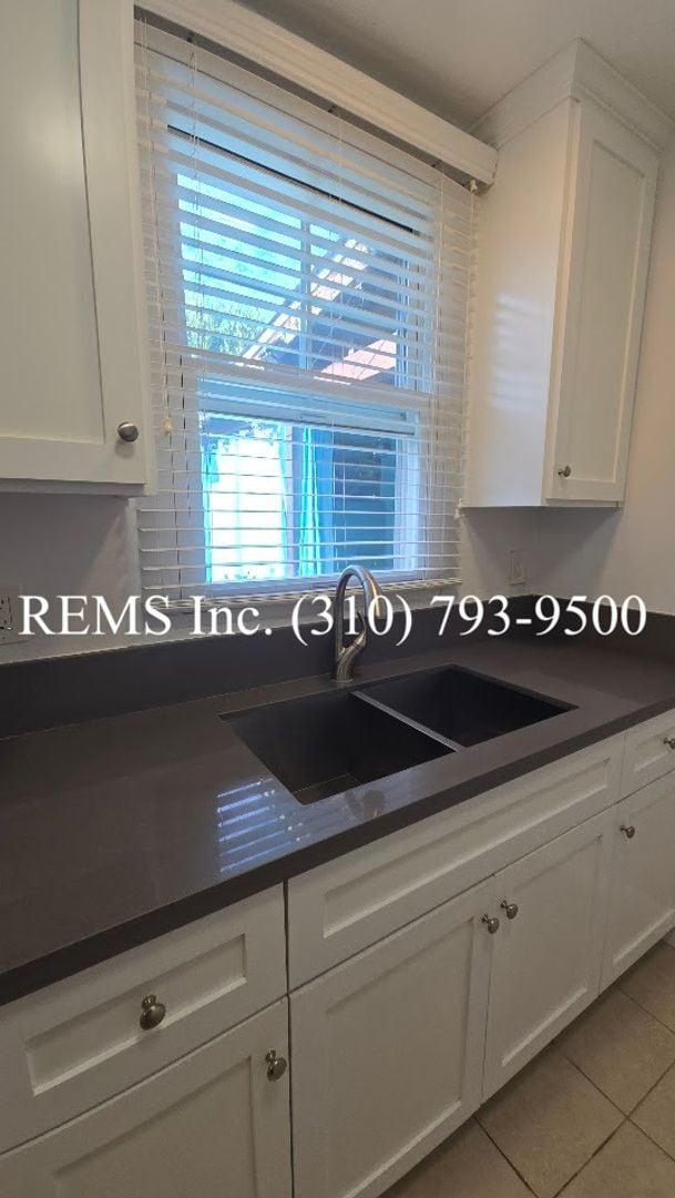 Photo - Remodeled 1 Bedroom Upstairs Apartment w/ Garage Parking Unit 9038