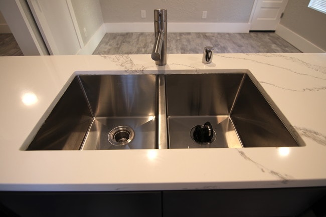 new faucet and sink - 1428 E Florida St Unit 2 fl.