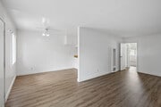 2BR, 1BA - Living Room and Dining Room - Anderson Apts