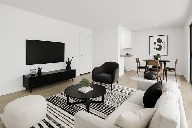 Building Photo - Spacious & Sunny 1, 2, and 3-bedroom apart... Rental