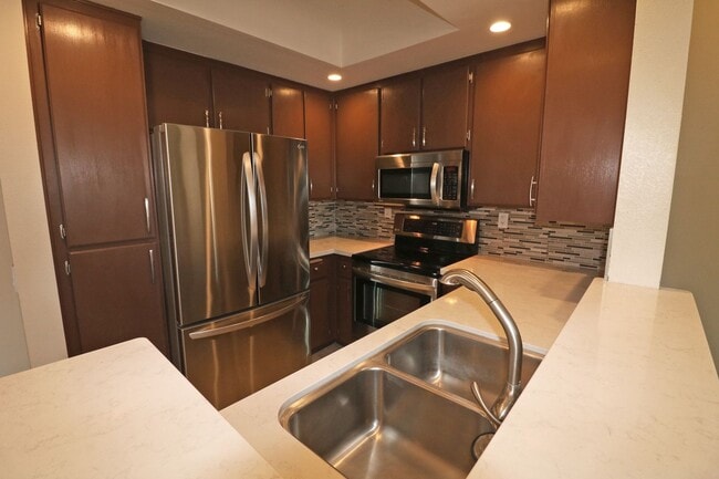Photo - Mission Valley condo (River Colony) with balcony!  Central heat/ air. Gated garage parking. Pool/...