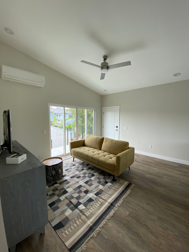 Living room, sliders to deck - 3662 Quimby St Unit ADU