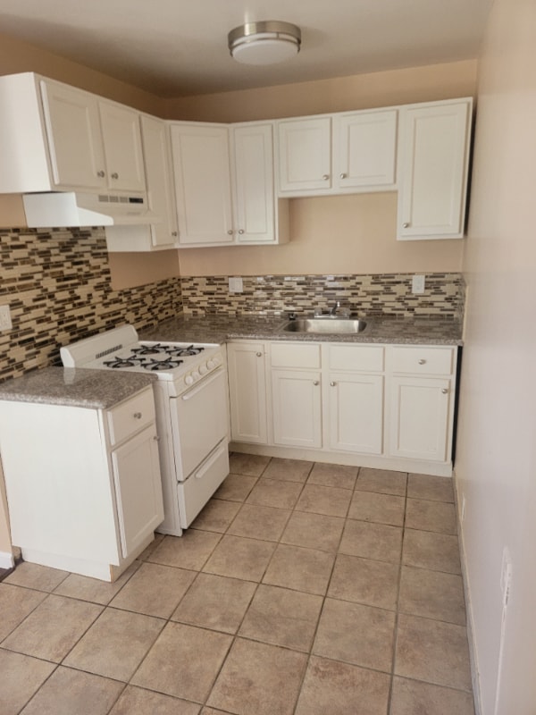 Building Photo - 3333 E Wilton St Unit 2