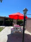 BBQ Picnic Area, Entrance to Apt A - 4607 Plaza Ln Apartments