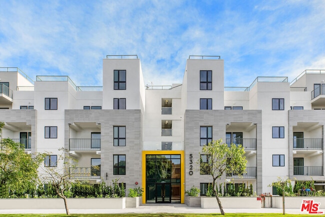 Building Photo - 5320 Cartwright Ave Unit 307
