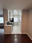 Kitchen from Dining Area - 325 S Doheny Dr Apartments
